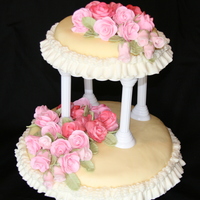 Tiered Cake With Flowers I should have made this cake thicker, but decided to spend my time more on the flowers & how they appeared.