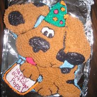 Dog This was a cake I did for my Father in law. The cake was sugar free. I used sugar free cake mix & made my was buttercream but I...