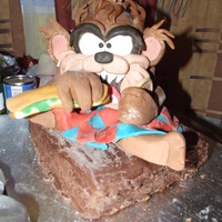 Debbie Brown Cartoon Cake I Made This was for my husband birthday last october. His birthday on halloween, ive never had any experiance with fondant had no idea what it was...
