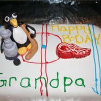 Hockey Cake This cake was for my grandpa, he was a fan of the Detroit Red Wings and my husband a fan of the penguins, this is why the penguins are...