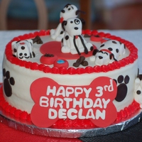 Puppy Themed Birthday Cake Dalmation themed child's birthday cake. Everything was made out of fondant. Icing was vanilla buttercream and cake was chocolate fudge...