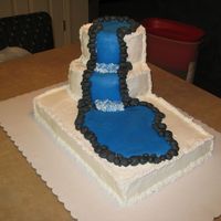 Waterfall Cake This cake was made for a church function at a church called "New River." The cakes are plain white cake iced with buttercream....