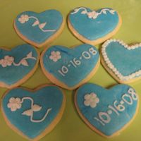 Wedding Cookies I made these for our wedding open house/reception. They are NFSC done with a cutter from the Wilton 101 Cookie Cutters set. The icing is...