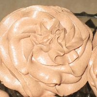 Tag-A-Long Cupcakes These cupcakes are a chocolate version of the White Almond Sour Cream cake, then they are filled with slightly under-done peanut butter...