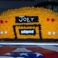 Bus Cake This was for my little cousin's first birthday party! He was obsessed with his toy bus, so I made him a bus cake. It's just white...