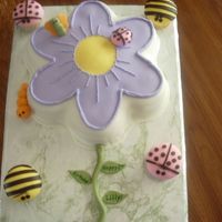 Lilly's Flower Cake Wilton Dancing Daisy pan. WASC with strawberry filling, buttercream icing and regular & chocolate MMF. Cupcakes are WASC, no filling....