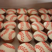 Baseball Cupcakes WASC and chocolate cupcakes, BC under MMF. Royal icing stitches. Thanks for looking!