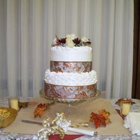 Fall Wedding Cake small two tier wedding cake with bettercreme icing and fresh flowers