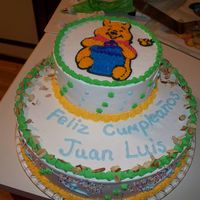 Winnie The Pooh Tres Leche cake stacked....didn't know if I could do this because of the three milks....but it seems to have worked
