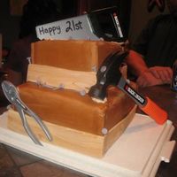 Carpenter's Cake This was my 2nd ever cake for my brother's 21st birthday party. He is a carpenter so the theme fits :) I actually wasn't too...