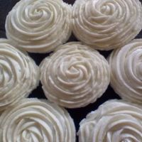 White Rose Swirl Cupcake just plain and simple swirled cupcakes using a 1M tip.