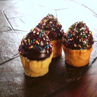 Mini Ice Cream Cones these were made just because i wanted some cake and i hadn't used this pan yet. it's the mini ice cream cone pan from wilton. i...