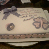 Pink And Purple Baby Shower Cake The cake was marble with a vanilla buttercream. This was my second attempt at a pacifier and it came out better than expected. TFL!