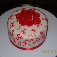 Red & White Wedding Cake And Cupcakes Made this for a friend's wedding, she was having a small ceremony and requested 2 dozen cupcakes and a 6 inch round vanilla cake with...