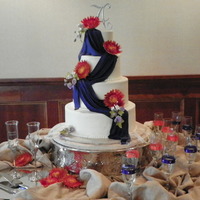 Dianna 14" 11" 8" and 5" WASC iced in buttercream with gumpaste flowers and fondant drapes