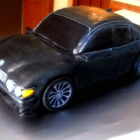 Bmw 745 Li This is a Grooms Cake...it was a chocolate pound cake with vanilla buttercream, covered in fondant with fondant and RI details. The cake...