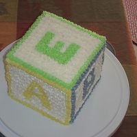 Baby Block This baby block cake was for a friend's baby shower. To make the cube, I baked several layers of round pound cake and stacked them...