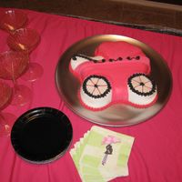 Hot Pink Baby Carriage I did not make this cake, but it was made for my baby shower by a good friend. She used the Wilton baby carriage pan and Wilton fondant...
