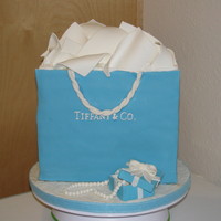 Gift Bag Cake This was made for a friend on her birthday. "Tissue" is made from pastillage as well as the jewelry box. Thanks for looking.
