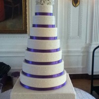 Round Wedding Cake This picture isn't the finished cake, the remaining flowers were not ready yet. The florist was still preparing them. Three of the...