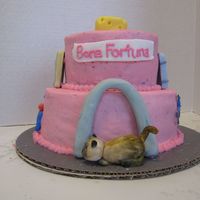 Whitney's Going Away Cake My first two-tier cake EVER! Chocolate WASC, buttercream frosting, fondant figurines. She basically wanted a pink cake and I decorated it...