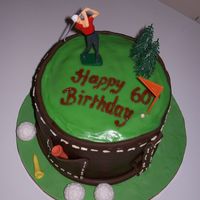 Dad's 60Th Cake Golf bag, tees and balls made from RTR icing. Wilton golf topper. Stitching with vanilla choc fudge frosting. First attempt :)