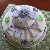 Emily's 3Rd Birthday Butter cake w. vanilla buttercream and MMF (first time with fondant). Not exactly what I was hoping but okay for a first try.