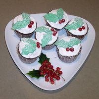 Holly Cupcakes Gorgeous spiced cupcakes (like gingerbread/chocolate) with royal icing. Redcurrants for holly berries and RTR leaves - had no cutter so had...