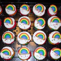 Mckenna's Birthday Cupcakes Rainbow cupcakes with rainbow cookie toppers