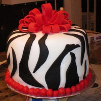 Zebra This cake was so much fun! 3 8in round strawberry layers, cream cheese icing under the fondant. I guess thats why people use buttercream or...