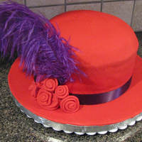 Red Hat Society Cake Red velvet cake covered in red fondant. Rolled fondant roses.