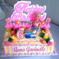 Barbie Birthday Cake Chocolate cake with marshmallow icing decorated with roses sugar flowers that i made:)