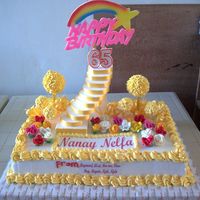 Bday Cake Chocolate cake with marshmallow icing and sugar flowers.:)