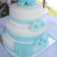 Sindias_Cake_013.jpg 16" BOTTOM CAKE, PINAPPLE W/PINAPPLE FILLING, 2ND CAKE 14" LEMON CAKE W/LEMON FILLING, TOP 10" SAME AS BOTTOM. THIS CAKE WAS...