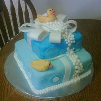 Rubber Ducky Cake VANILLA AND CHOCOLATE CAKE, WITH BUTTERCREAM FILLING AND ALL MADE OUT OF FONDANT.