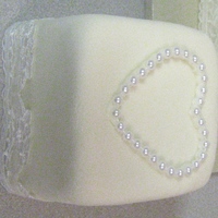 Honneymoon Cake I always make a small 4x4 cake, kind of like the wedding cake. It is ment to go with the couple on them to there honneymoon.