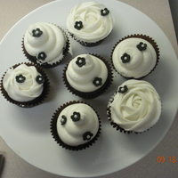 Black And White Cupcakes Chocolate cupcakes with coconut cream cheese frosting and gumpaste flowers