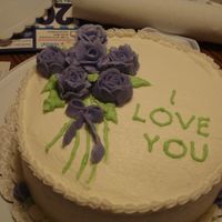 Wilton Course 1 Final Cake My "chocolate tuxedo cake" (Devils Food with strawberry filling topping with white chocolate shavings) iced in buttercream. I...