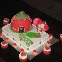 Strawberry Shortcake At Home Fondant covered house, buttercream covered scene. Trees made from chocolate melts.