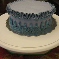 Ruffles And Frills This cake came about because of leftover batter from a larger cake and so I decided to practice my ruffle work. Still needs some work, but...