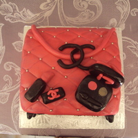 Chanel i made this for my neighbours 16 year old daughter, vanilla cake, fondant accents thanks for looking