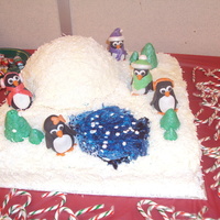Winter Wonderland i made this cake for our Christmas party at work, vanilla, smbc, coconut, i made the pengiuns out of rkt, fondant and accented them with...