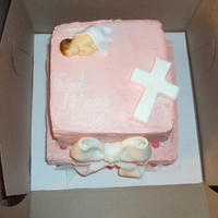 Christening Cake lemon raspberry cake with lemon smbc filling and plain smbc, fondant baby cross and bow thanks for looking