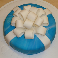 Present Just a lil present I made for my last Wilton cake class. The whole week was so crazy busy for me that I literally just put this together...