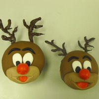 Rudy Fondant Rudolph cupcakes with chocolate antlers.