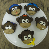 Bunch Of Monkeys! I made these monkey cupcakes for my mom on her birthday a couple weeks ago. Each monkey is supposed to resemble a certain characteristic of...