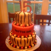 Zebra Payton Birthday Cake cake: 4 inch - pink with black zebra stripes 8 inch - tye die: pink, purple, green, blue 10 inch - pink all frosted in...