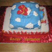 Iron Man Cake There weren't too many Iron Man cakes on here. So I thought I would make one. A friend wanted one for her son. It's all edible....