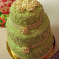 Green Apple Cake 35th Anniversary cake. Wedding colors were green apple and white. MMF with BC roses and scrolls.