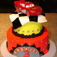 Car's Birthday I made this 2 tier Lightning McQueen Cake for a friend's 3 year old. A 9" and 6" iced in buttercream with fondant accents....